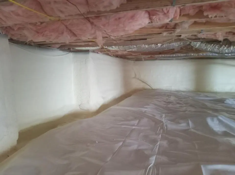 Crawl space encapsulation with closed-cell spray foam for Commercial Roof Restoration in Pennfield